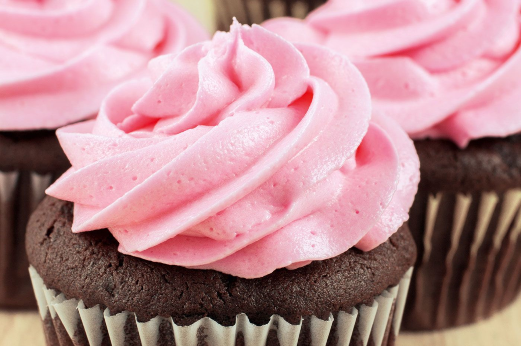 chocolate cupcakes with strawberry topping
